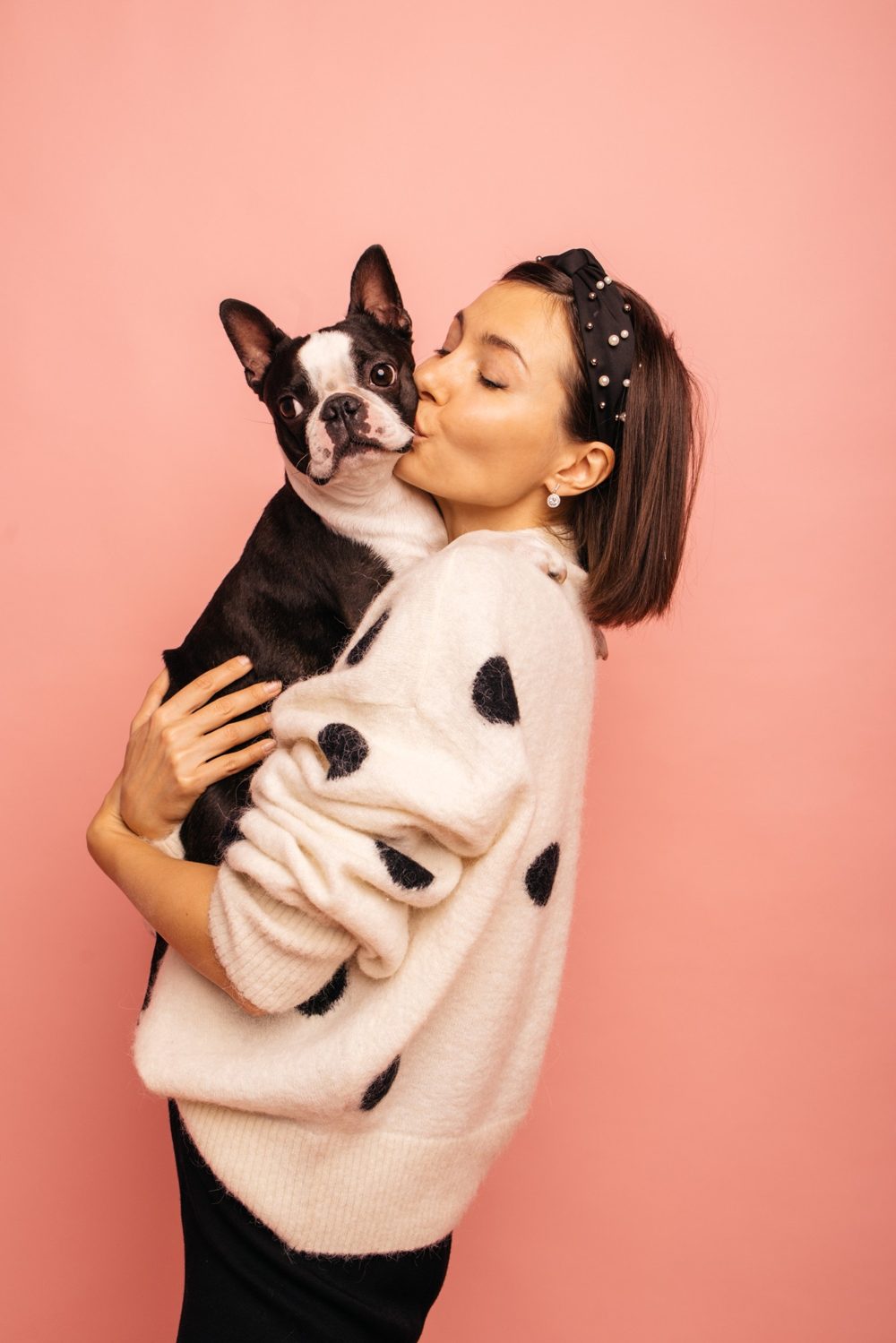 Woman hugging her dog